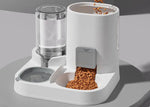 Dispensador automático de agua y comida para mascotas.